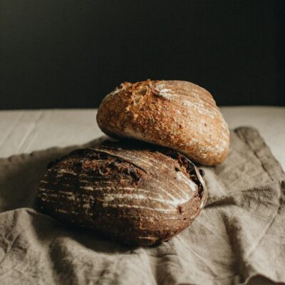 Loaves of bread on napkin