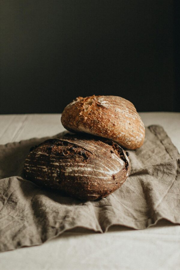 Loaves of bread on napkin